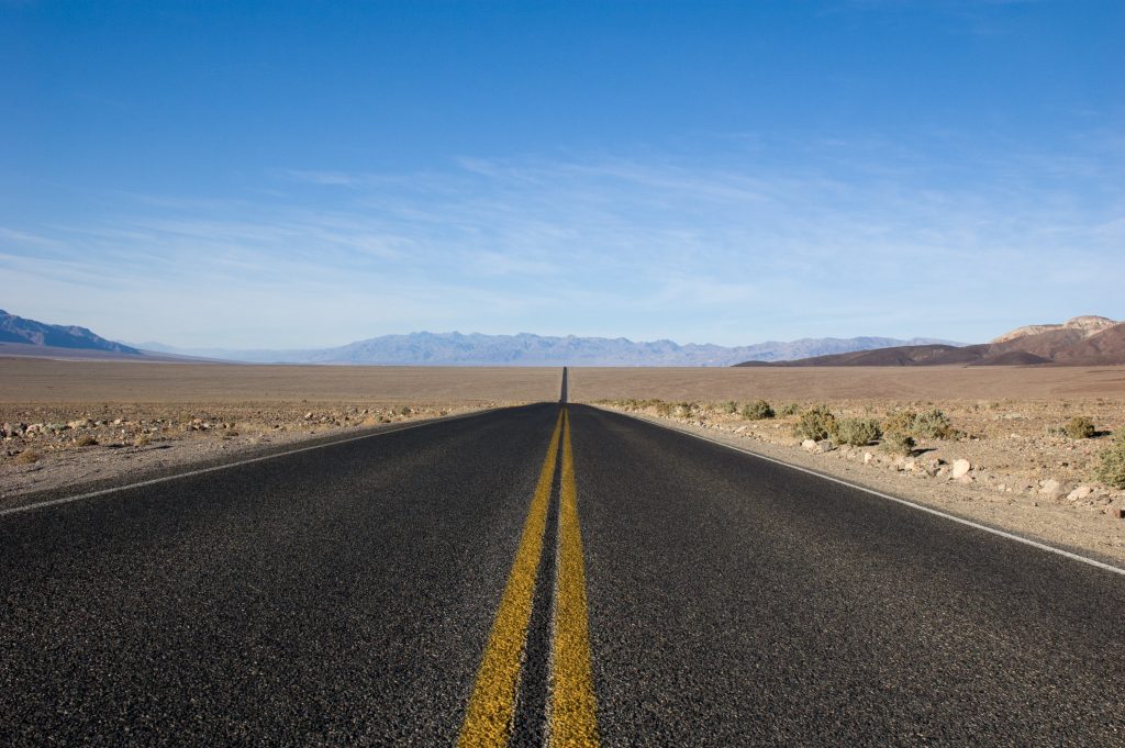 Desert road to the horizon