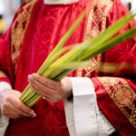 Man holding palm branches